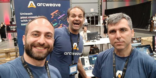 Members of the Arcweave team taking a selfie at a game convention.